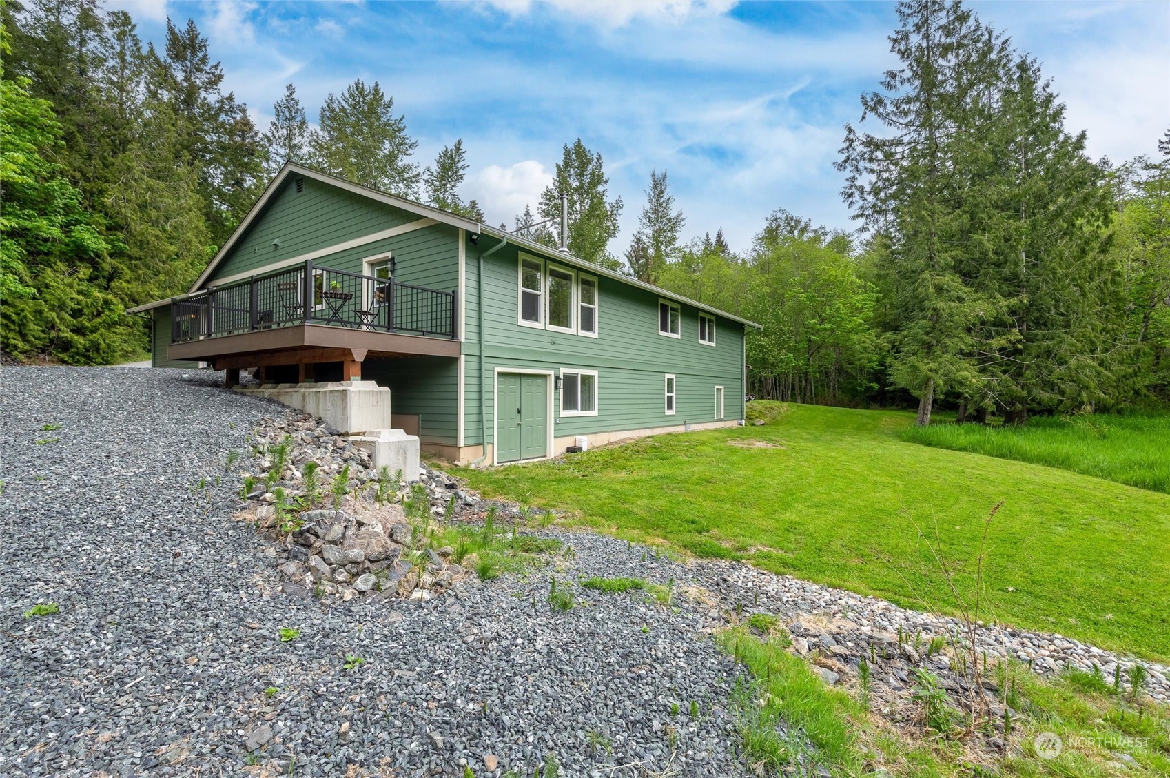 5052 Noon Road Bellingham, WA 98226 - Photo 3 of 40 a front view of house with garden