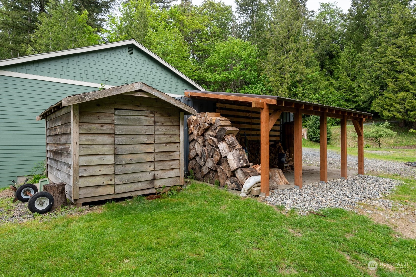 5052 Noon Road Bellingham, WA 98226 - Photo 10 of 40 a view of a backyard with a large tree