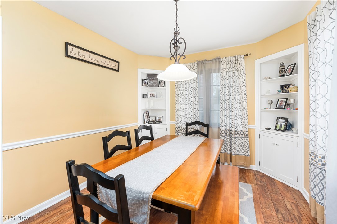 6254 Stanbury Road Parma, OH 44129 - Photo 15 of 44 Dining space with built in shelves and wood-style flooring