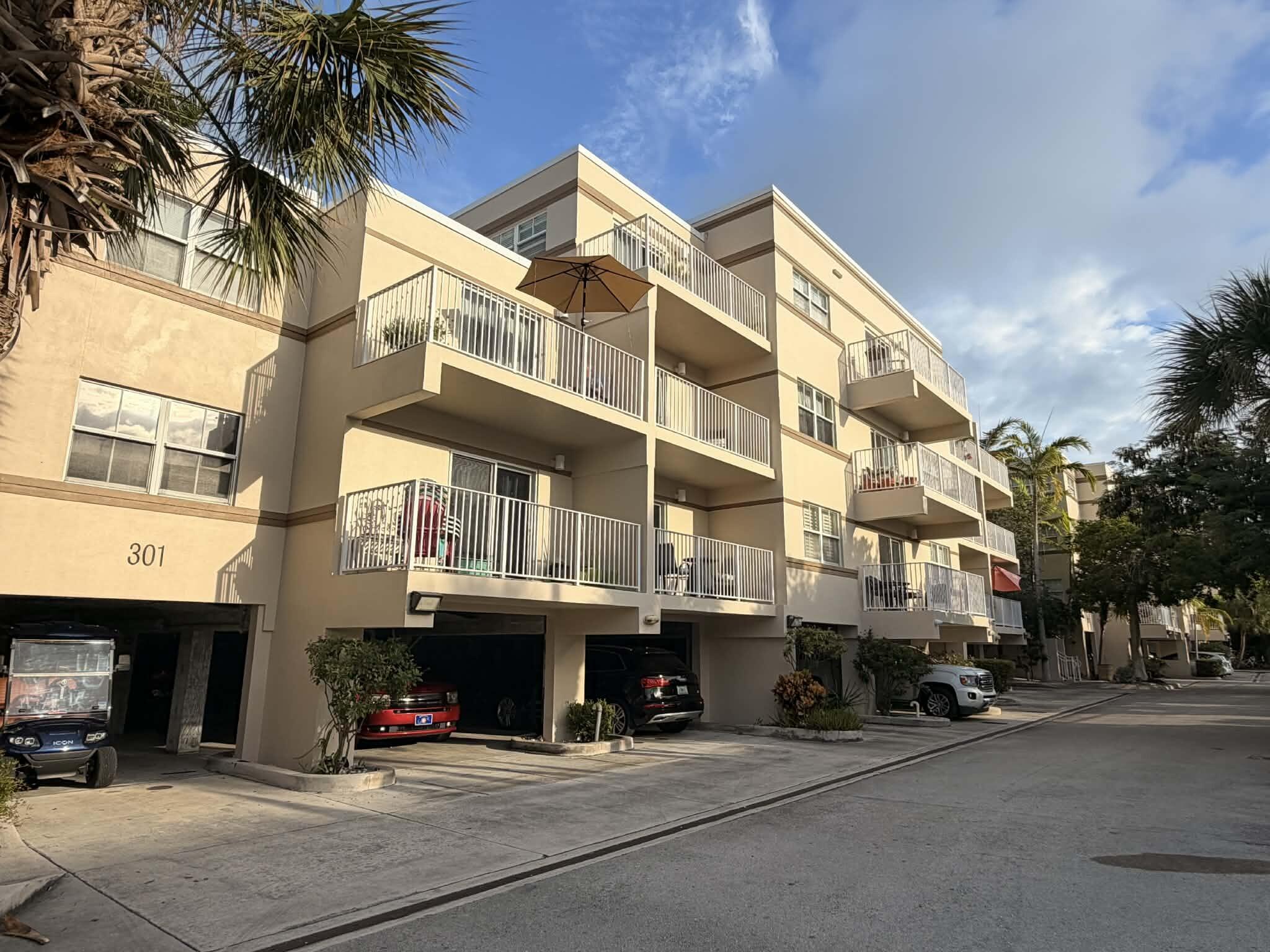 a view of a street with cars