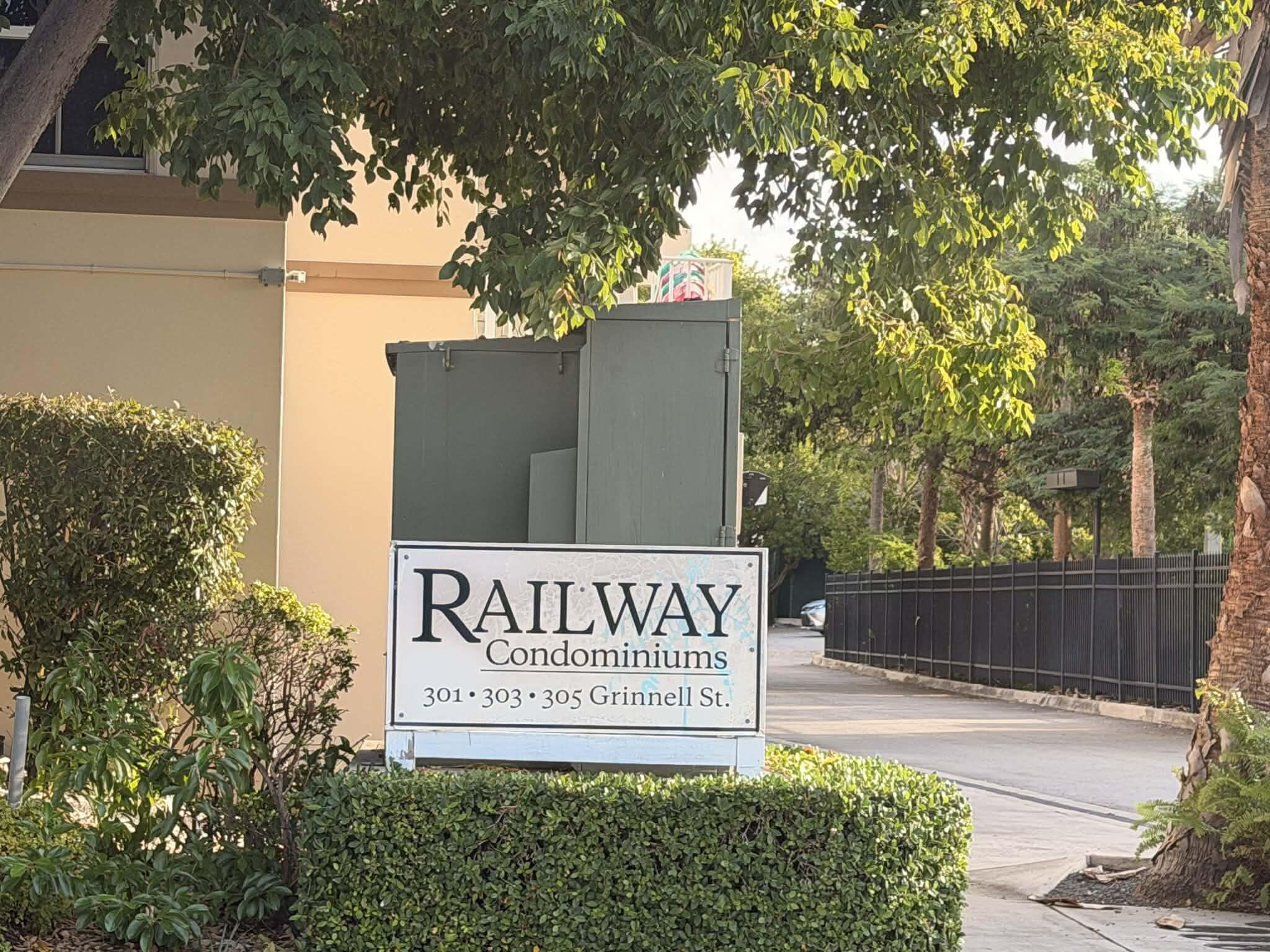 301 Grinnell Street, Unit A401 Key West, FL 33040 - Photo 2 of 8 a sign on the side of a building