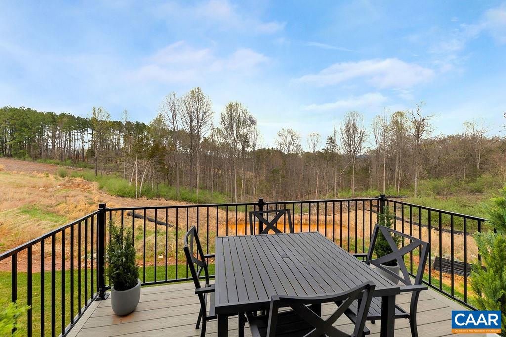 2245 Fowler Street Charlottesville, VA 22901 - Photo 23 of 27 a view of a balcony with wooden floor & fence