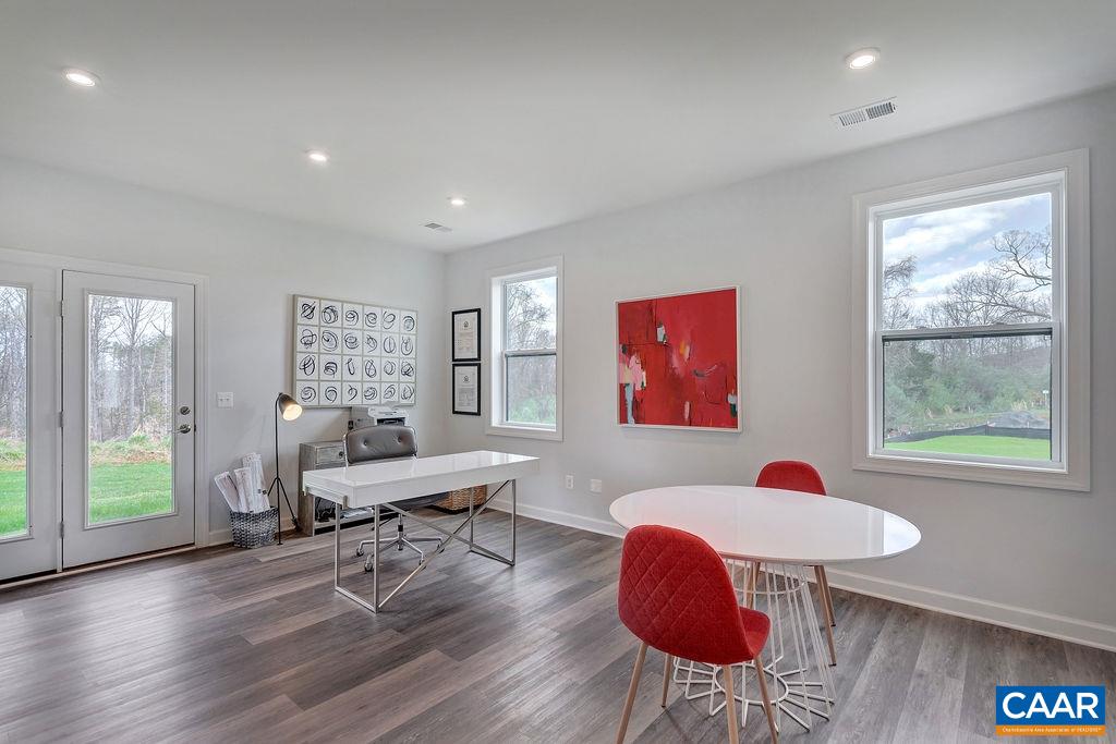 2245 Fowler Street Charlottesville, VA 22901 - Photo 4 of 27 a living room with furniture and a large window