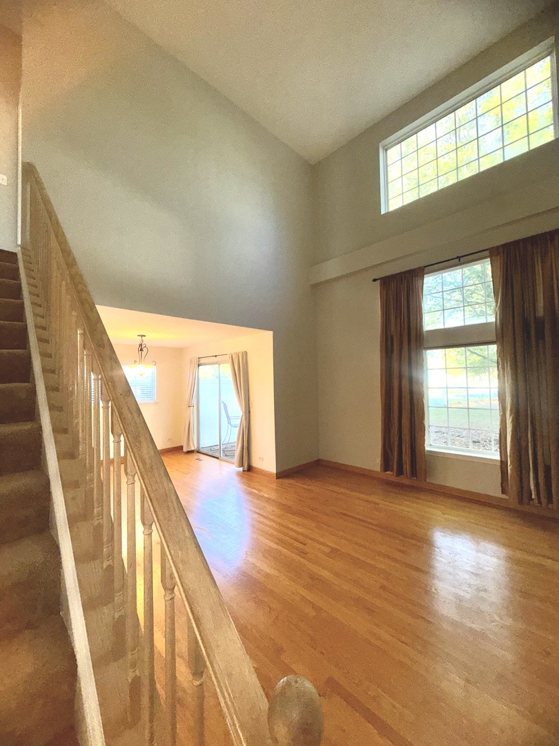 1198 Bristol Lane Buffalo Grove, IL 60089 - Photo 15 of 24 a view of an empty room with glass door