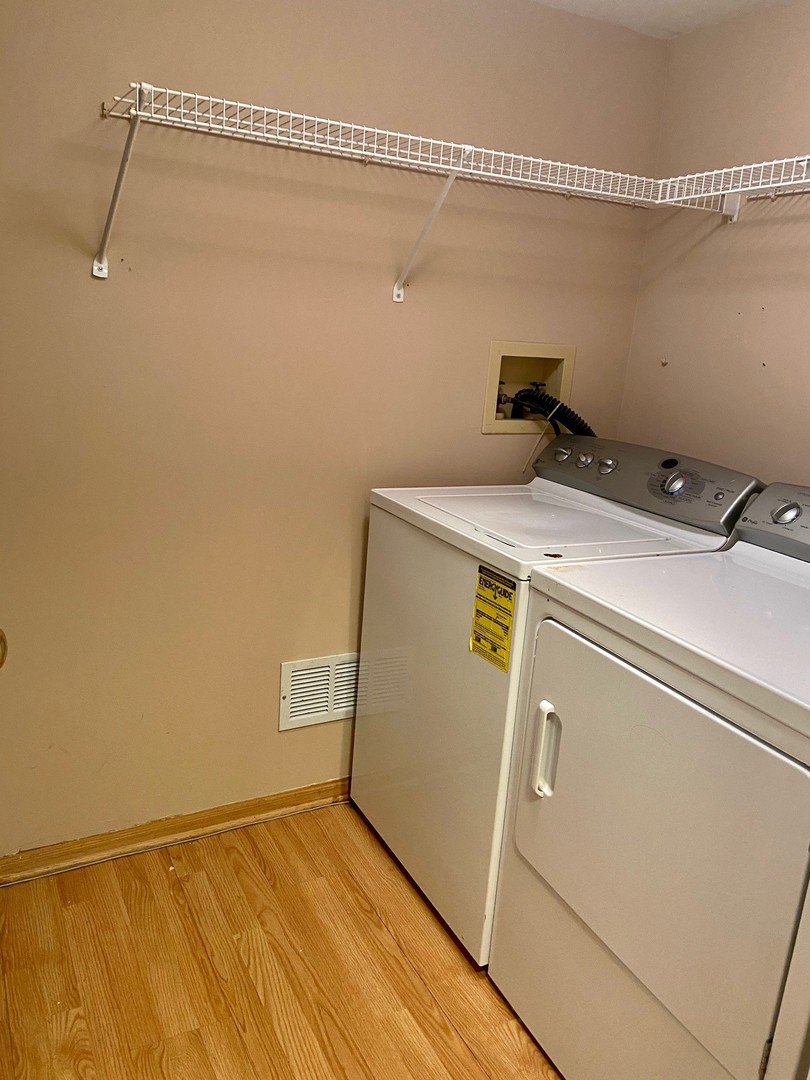 1198 Bristol Lane Buffalo Grove, IL 60089 - Photo 24 of 24 a utility room with dryer and washer