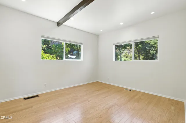 an empty room with windows