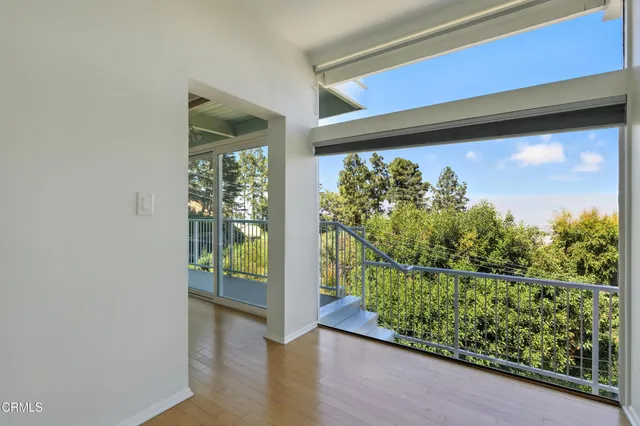 a view of a fountain in the backyard of a house