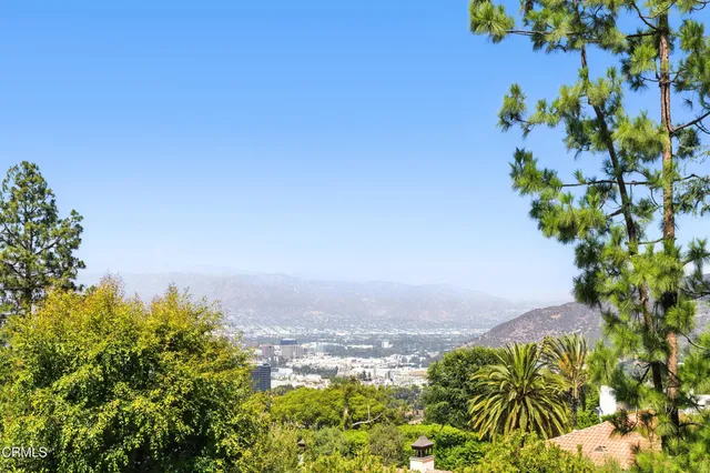 a picture of a book and a white wall