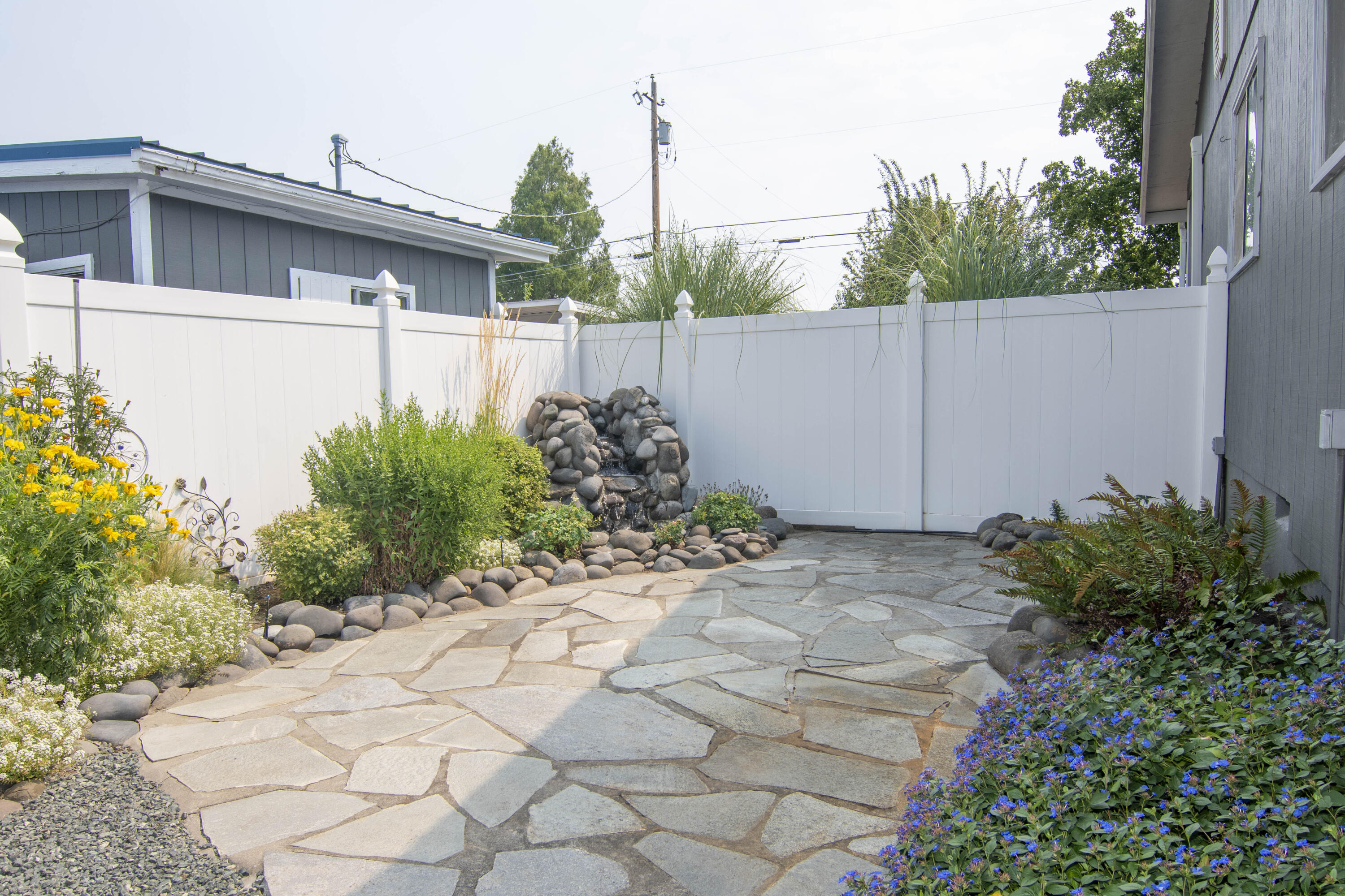 1728 Minear Road Medford, OR 97501 - Photo 36 of 68 Stone Patio with Water Feature