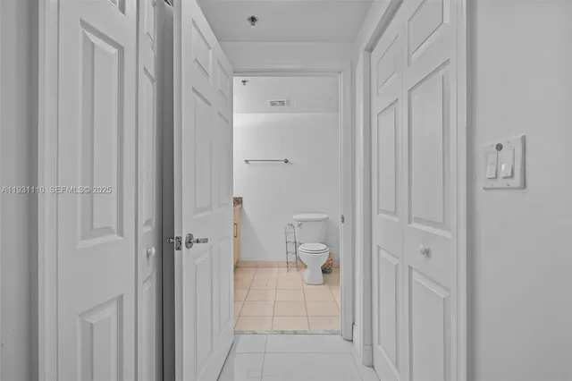 a bathroom view with a glass door shower