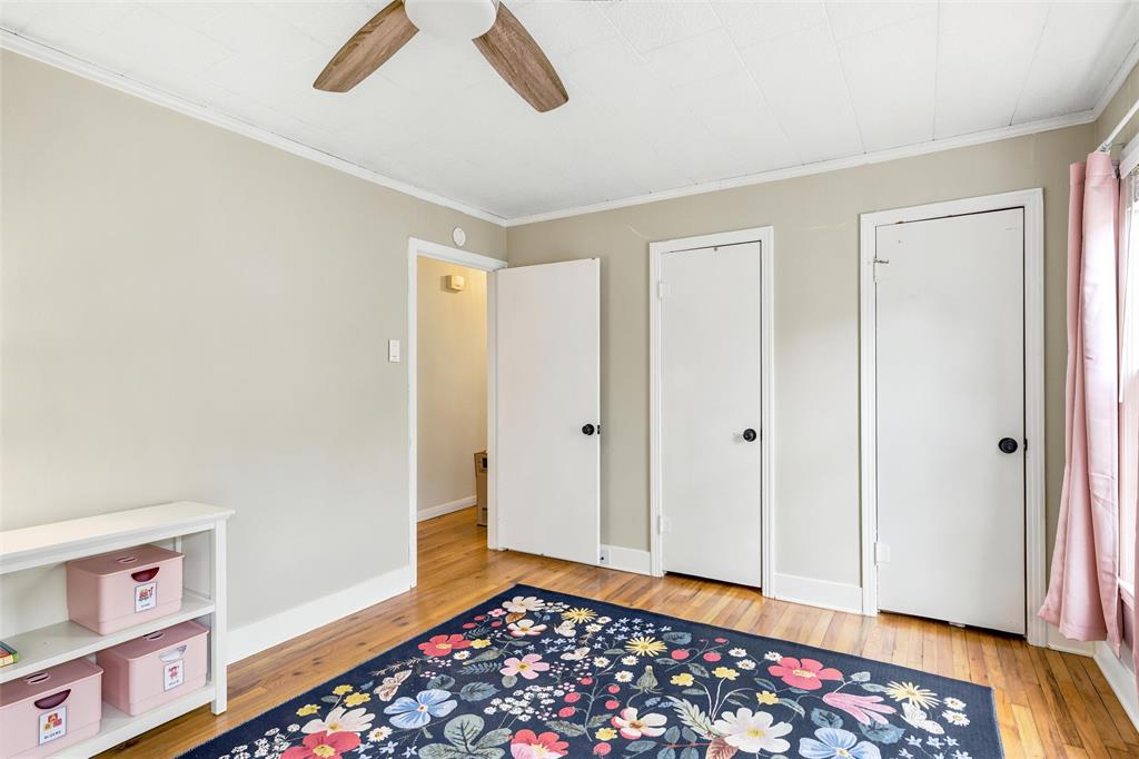 3012 Mitchell Avenue Waco, TX 76708 - Photo 11 of 18 Interior room featuring wood-finish flooring, light-toned walls, and white trim