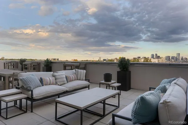 a view of a terrace with furniture