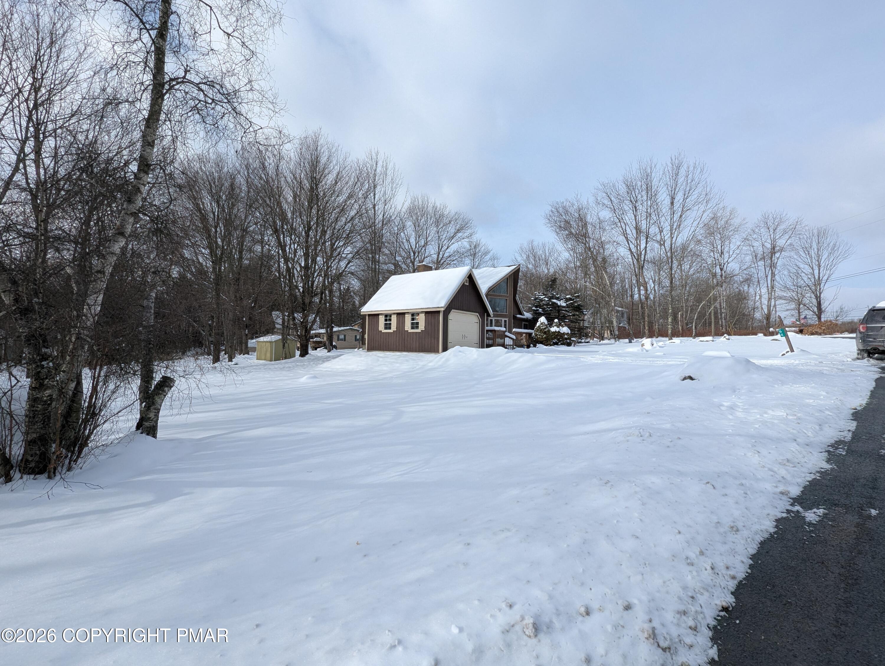 64 High Point Drive, Unit 2232 Lake Ariel, PA 18436 - Photo 4 of 12 a view of the road with a building in the background