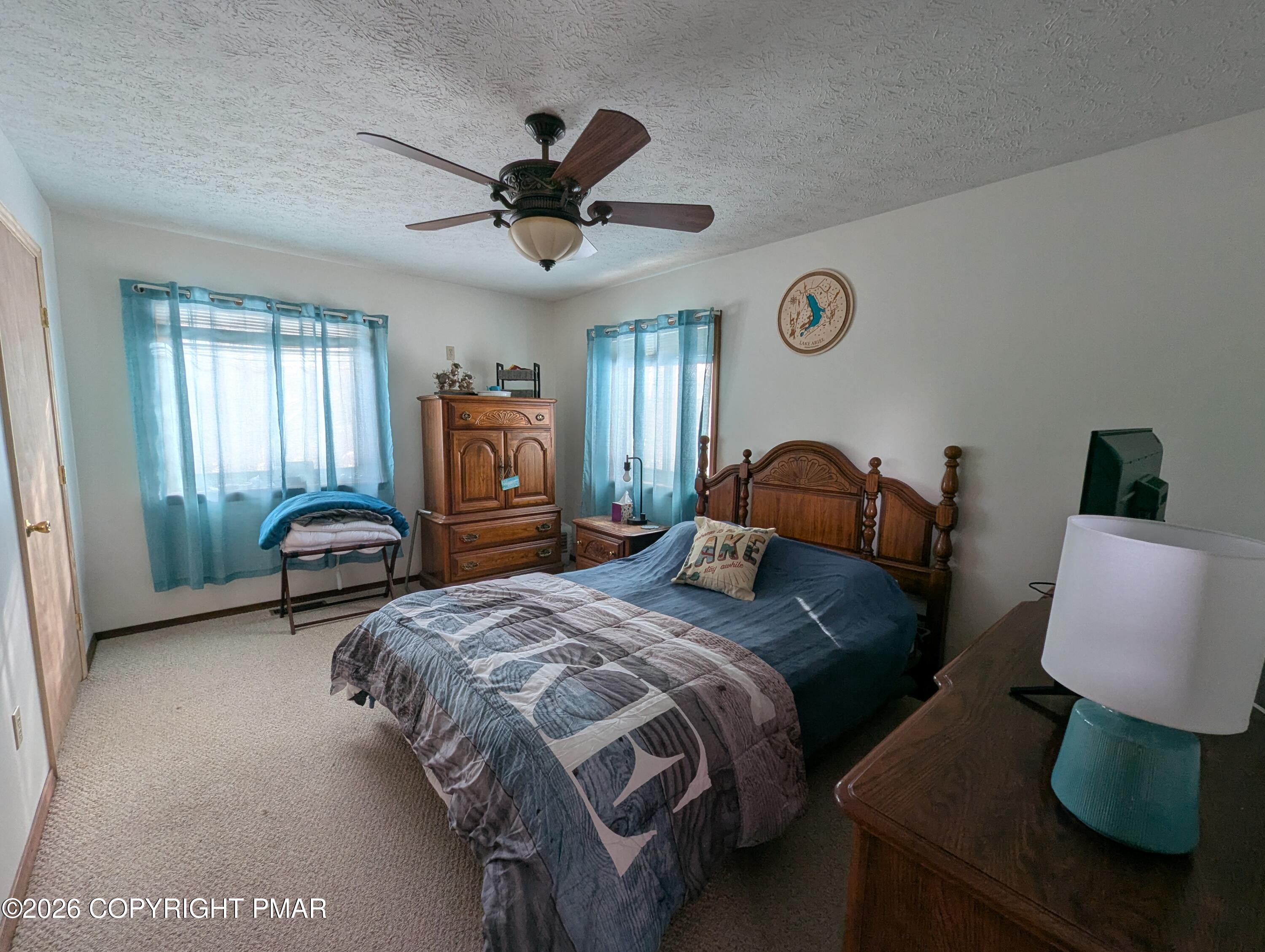 64 High Point Drive, Unit 2232 Lake Ariel, PA 18436 - Photo 10 of 12 a bedroom with a bed and window