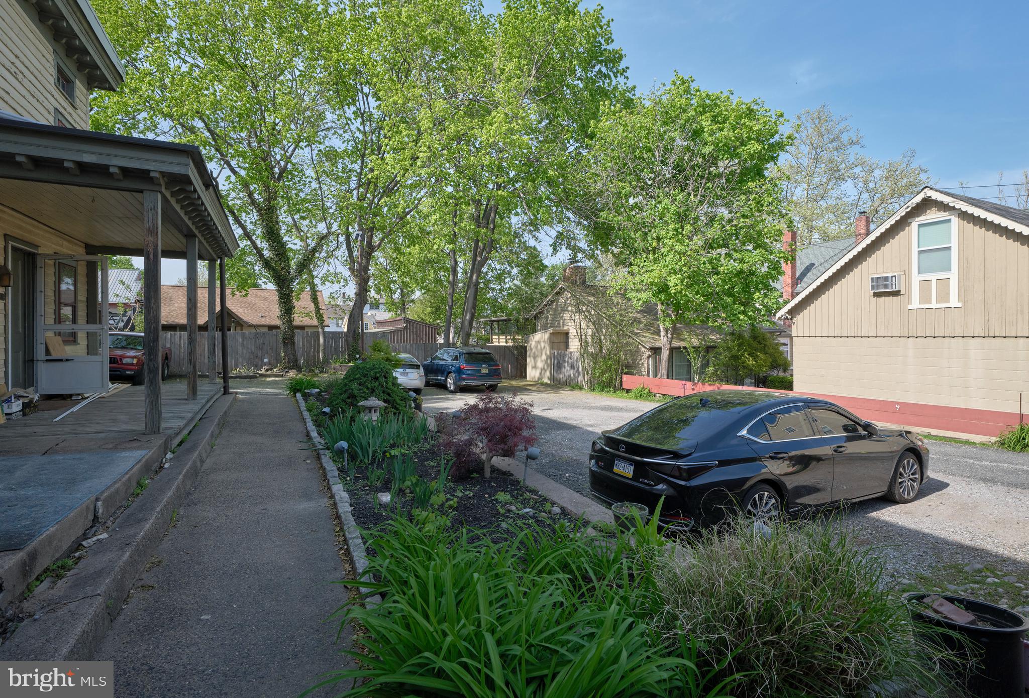 20 A W Bridge Street, Unit 20A New Hope, PA 18938 - Photo 6 of 7 a backyard of a house with yard and outdoor seating