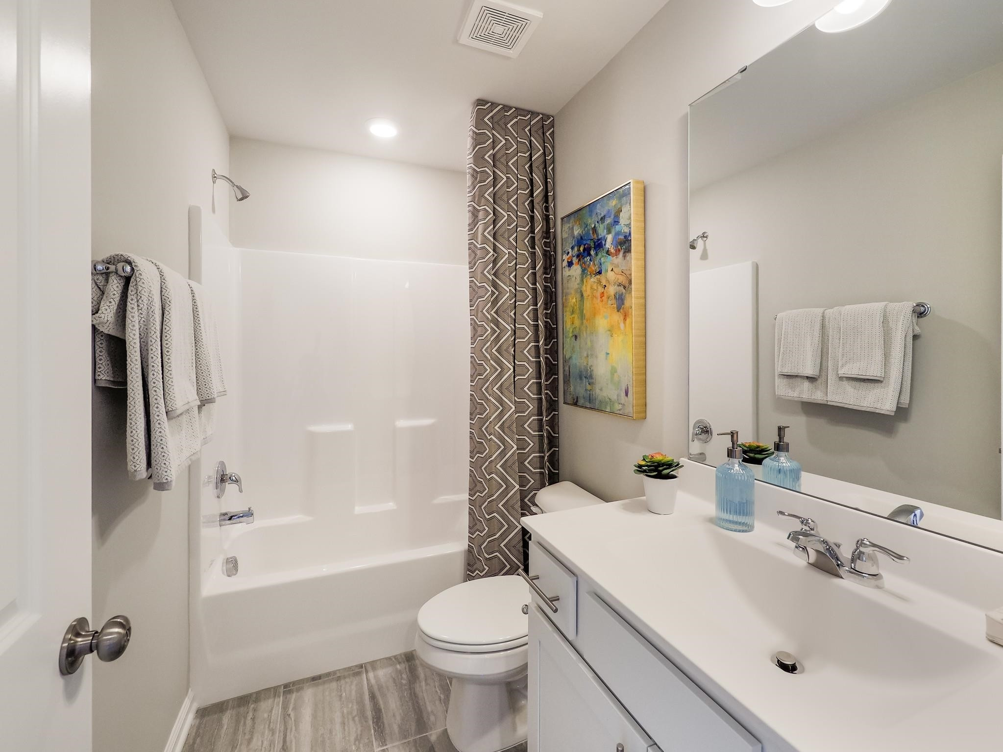 104 Sagebrook Drive, Unit 589 CHADWICK F Raleigh, NC 27610 - Photo 24 of 24 a bathroom with a sink toilet and shower