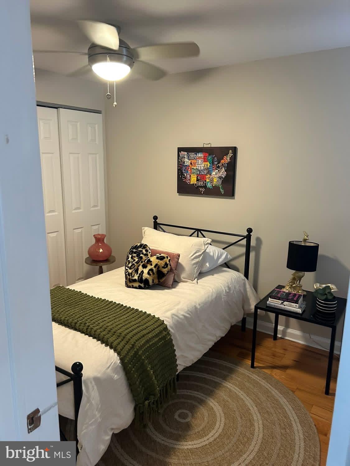 414 Durfor Street Philadelphia, PA 19148 - Photo 7 of 10 a bedroom with a bed and a tv on the dresser