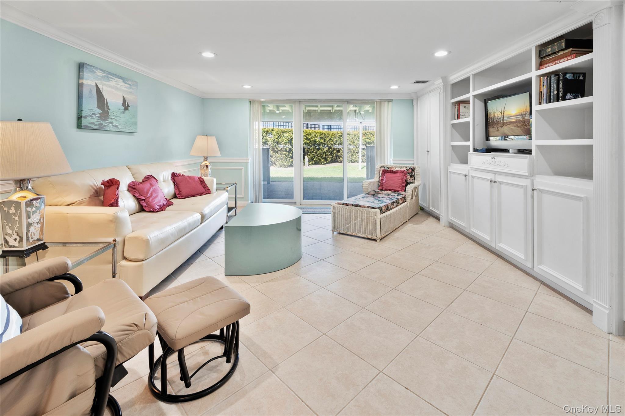 3012 Mitchell Road, Unit 3012 Westhampton Beach, NY 11978 - Photo 8 of 19 a living room with furniture and window
