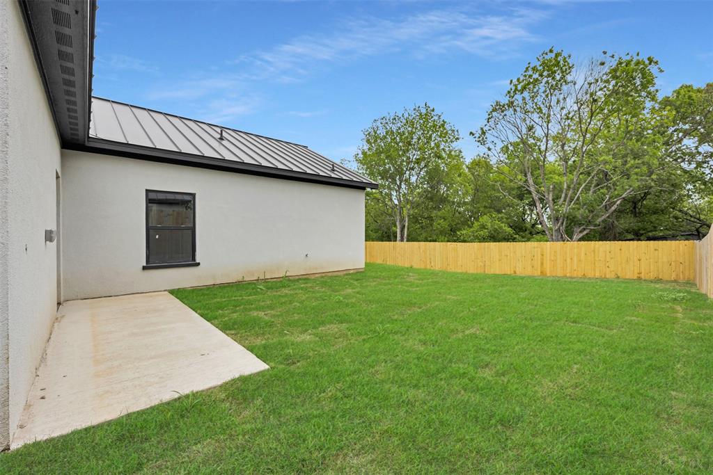 409 Dallas Street Rice, TX 75155 - Photo 24 of 26 a view of backyard with garage