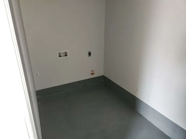 an empty room with a door