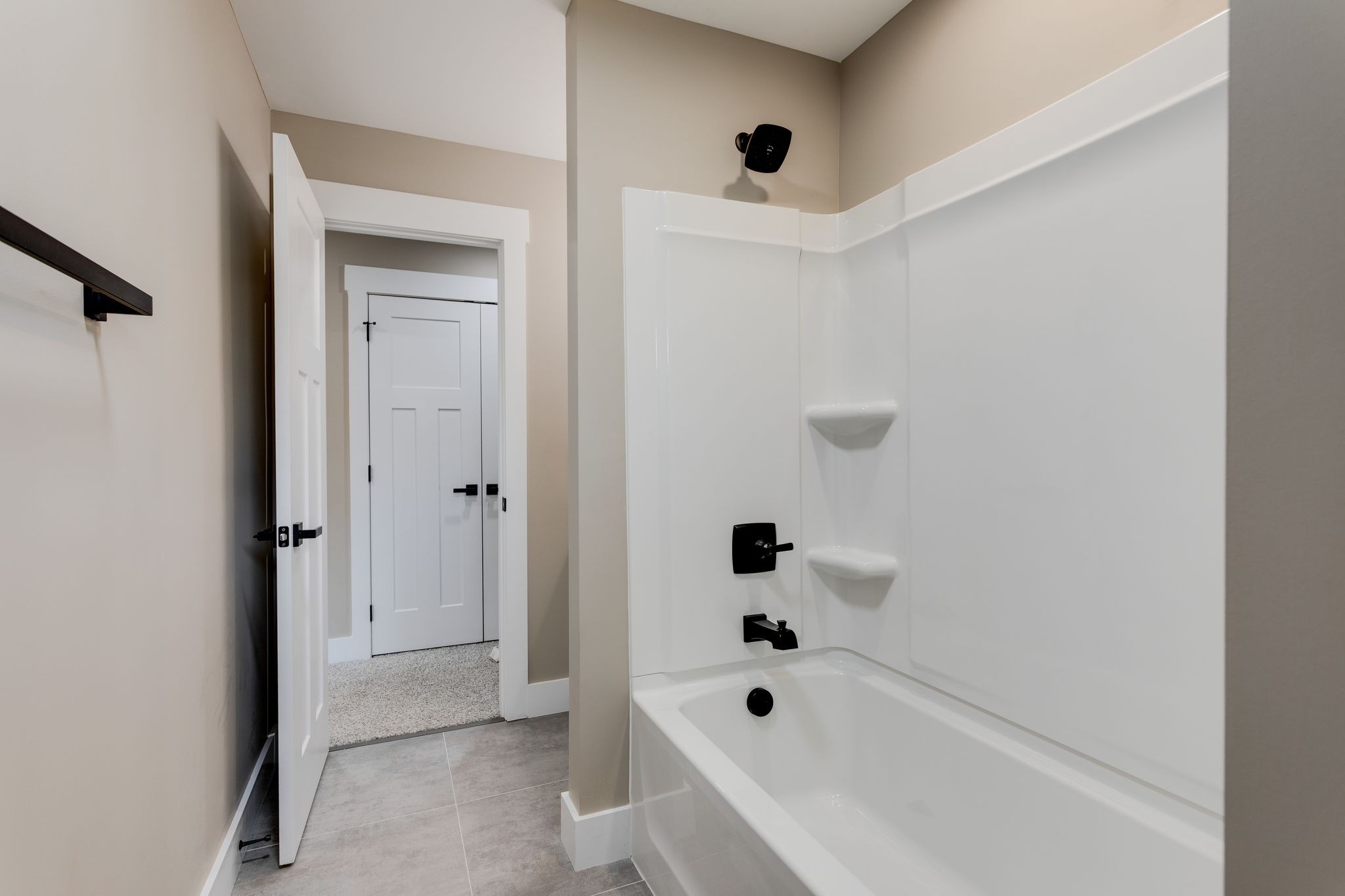 2259 Les Robinson Road Columbia, TN 38401 - Photo 28 of 31 a bathroom with a bathtub and shower