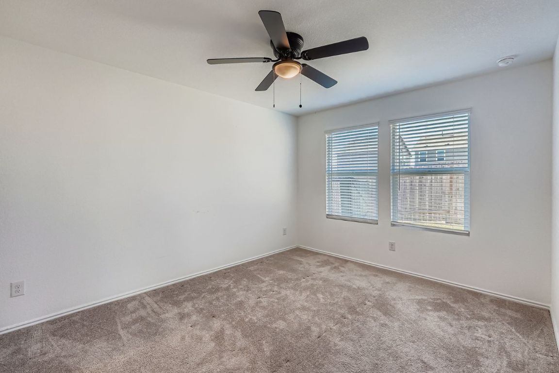 210 Sormonne Loop Kyle, TX 78640 - Photo 8 of 17 a view of room with a ceiling fan