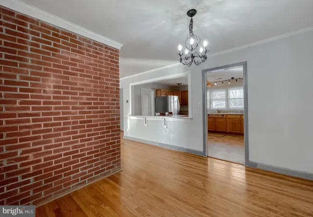 a kitchen with cabinets and appliances