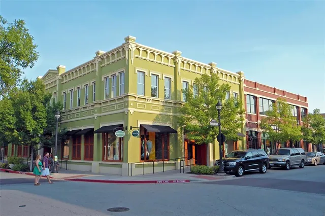 a view of a building with a street