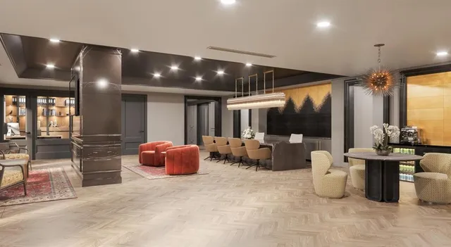 a dining room with furniture a chandelier and a flat screen tv