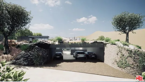 a view of a car parked in front of a building