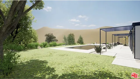 a view of a backyard of the house