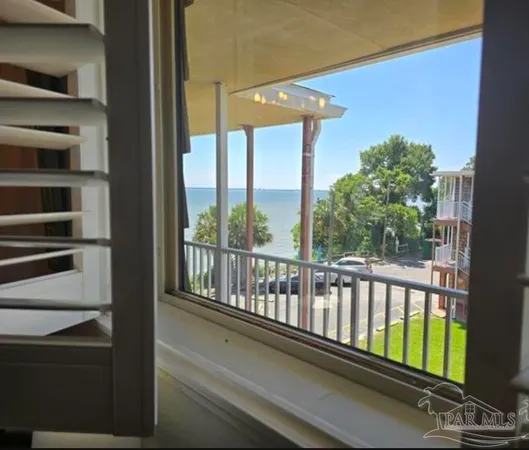 a view of a balcony with an outdoor space