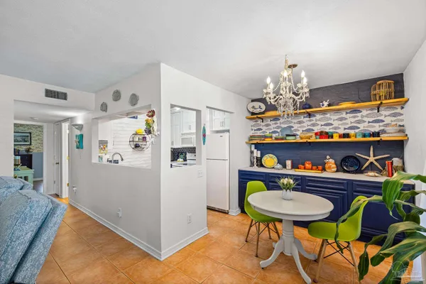 a room with lots of wooden furniture