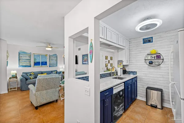 a view of living room with furniture and flat screen tv