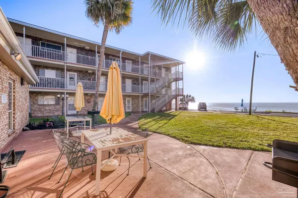 a view of a swimming pool with a lounge chairs