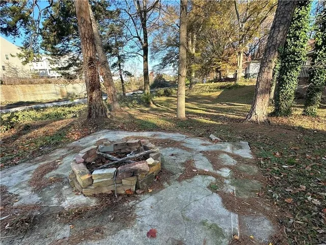 a view of a yard with an outdoor space