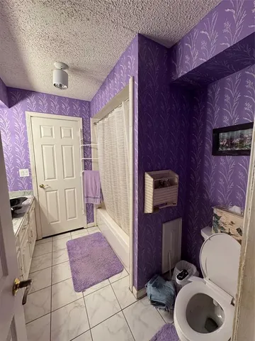 a kitchen with kitchen island granite countertop lots of counter top space