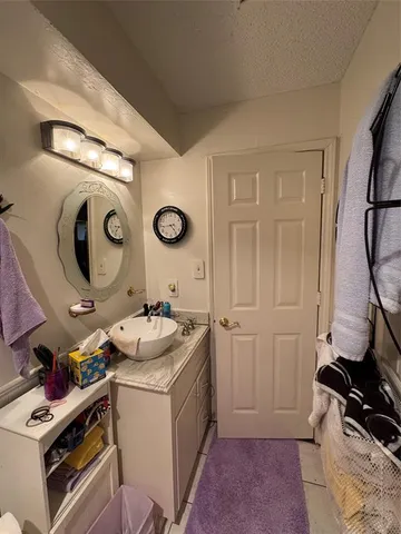a view of a patio with table and chairs