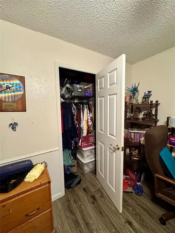 a view of house with outdoor space and seating area