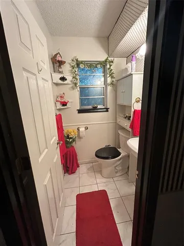 a view of yard with wooden fence