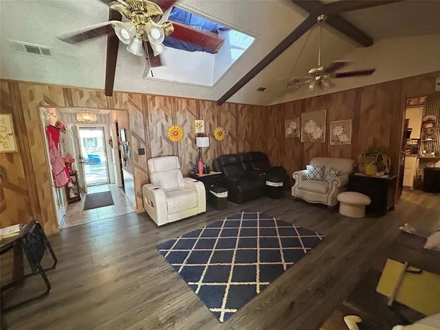 a spacious bathroom with a sink a toilet and shower