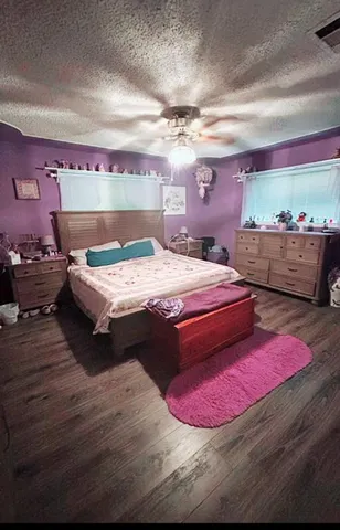 a room with furniture and a wooden floor