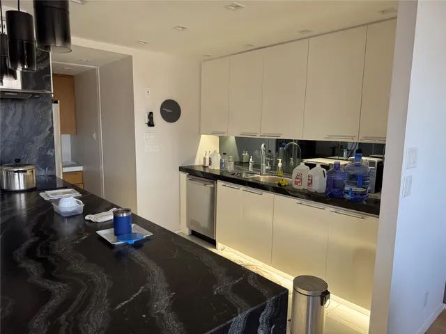 a view of a swimming pool with a yard