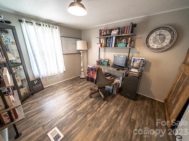 8331 Hills-View Road Oakboro, NC 28129 - Photo 27 of 34 a workspace with furniture and a window
