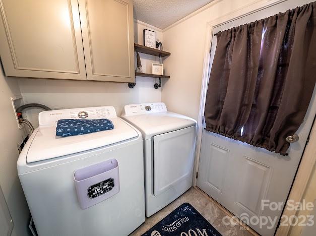 8331 Hills-View Road Oakboro, NC 28129 - Photo 29 of 34 a utility room with dryer and washer