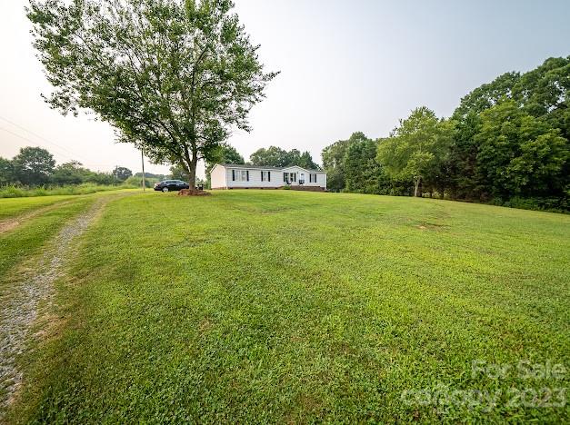 8331 Hills-View Road Oakboro, NC 28129 - Photo 4 of 34 a view of outdoor space and yard