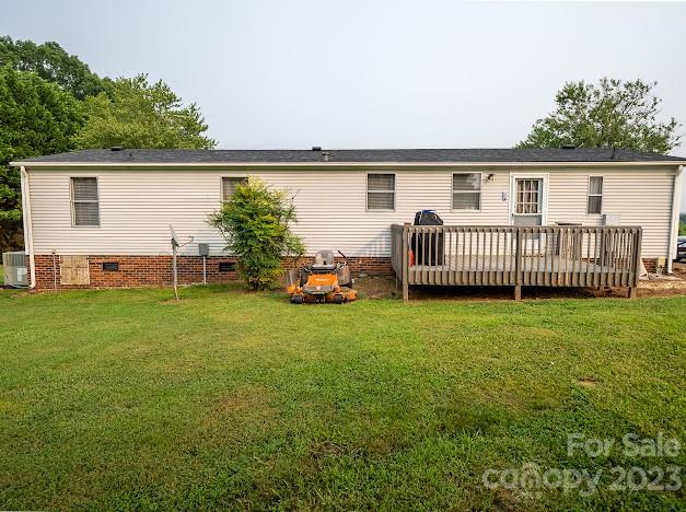 8331 Hills-View Road Oakboro, NC 28129 - Photo 6 of 34 a view of a house with backyard and sitting area