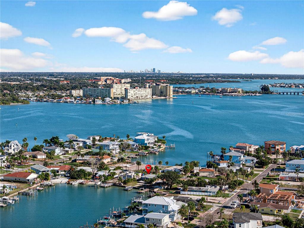 406 161st Avenue Redington Beach, FL 33708 - Photo 13 of 21 an aerial view of a city with lots of residential buildings and ocean view in back