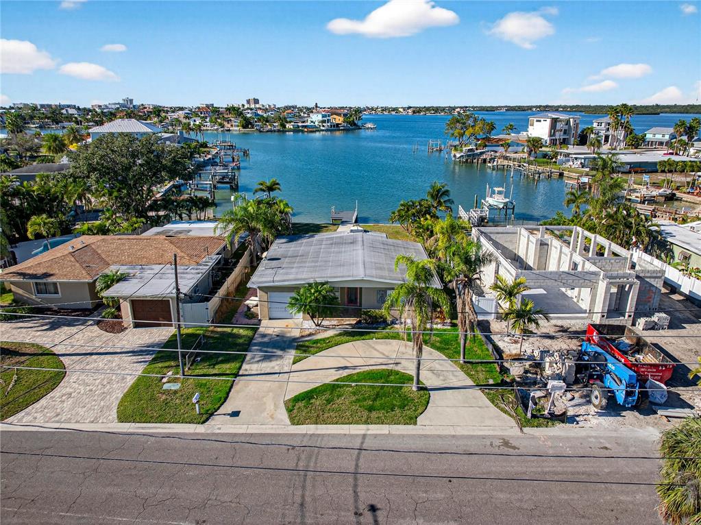 406 161st Avenue Redington Beach, FL 33708 - Photo 5 of 21 an aerial view of a house with garden space and outdoor seating
