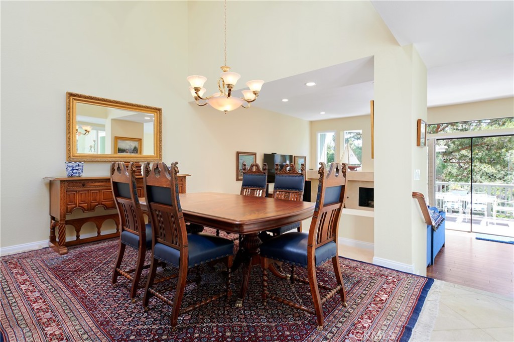 4 Lucerne, Unit 22 Newport Beach, CA 92660 - Photo 8 of 23 a view of a dining room with furniture window and wooden floor